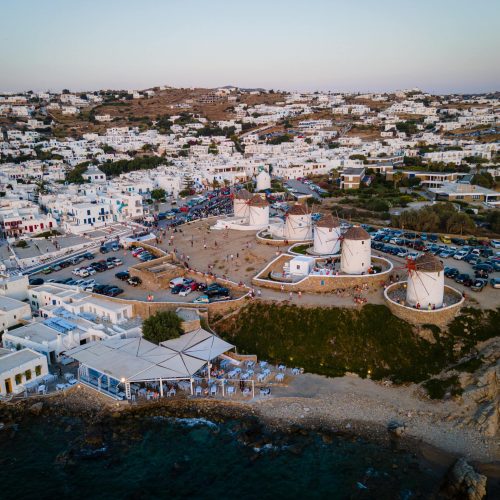 aerial-sunset-view-of-mykonos-old-town-and-port-2025-09-29-17-32-55-utc