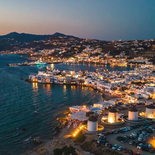 aerial-sunset-view-of-mykonos-old-town-and-port-2025-09-29-17-37-13-utc