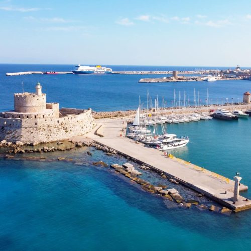 Mandraki port of Rhodes city harbor aerial panoramic view in Rhodes island in Greece